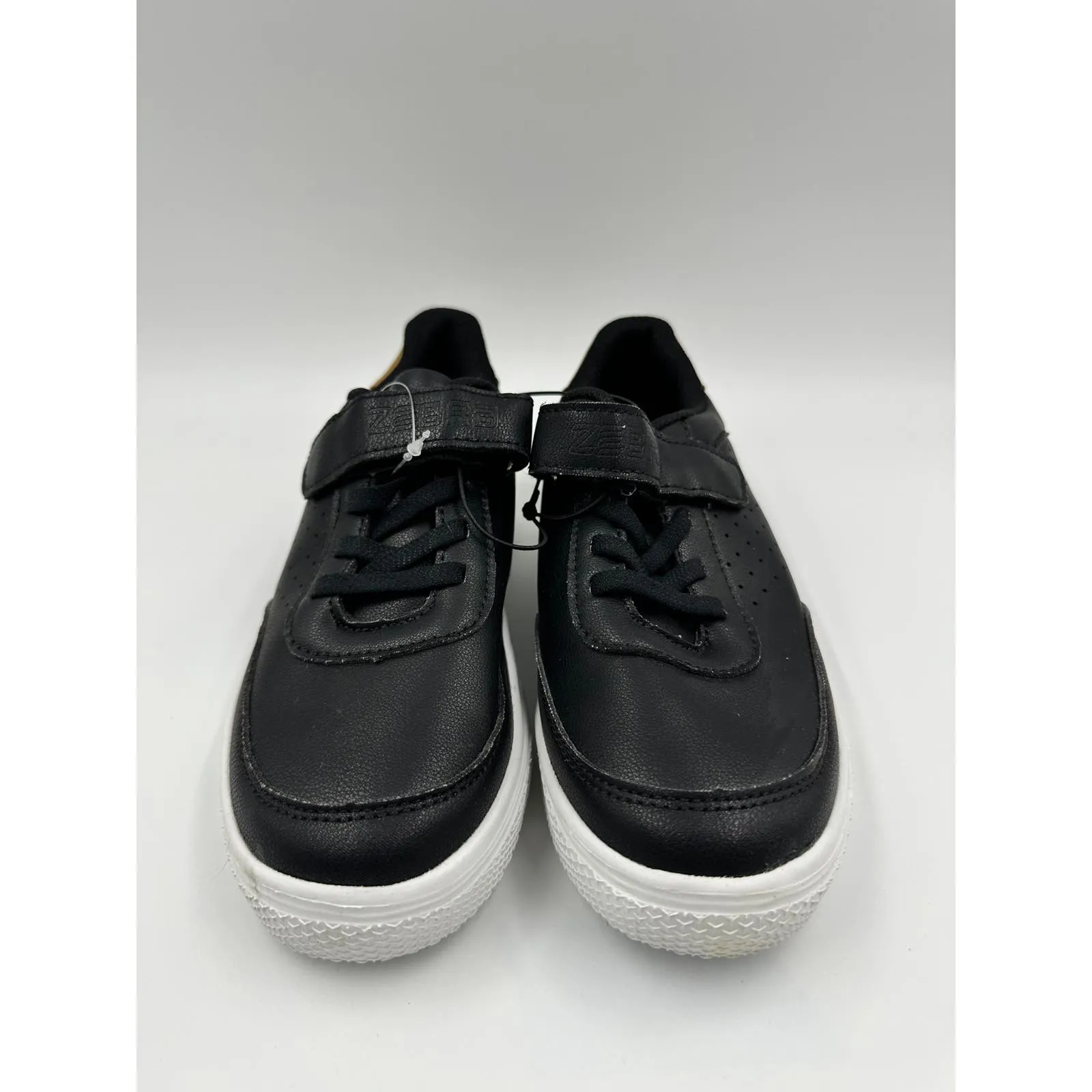 Big Kid Size 2, Black Fashion Sneaker with Strap, Brown Heel Accent & White Sole