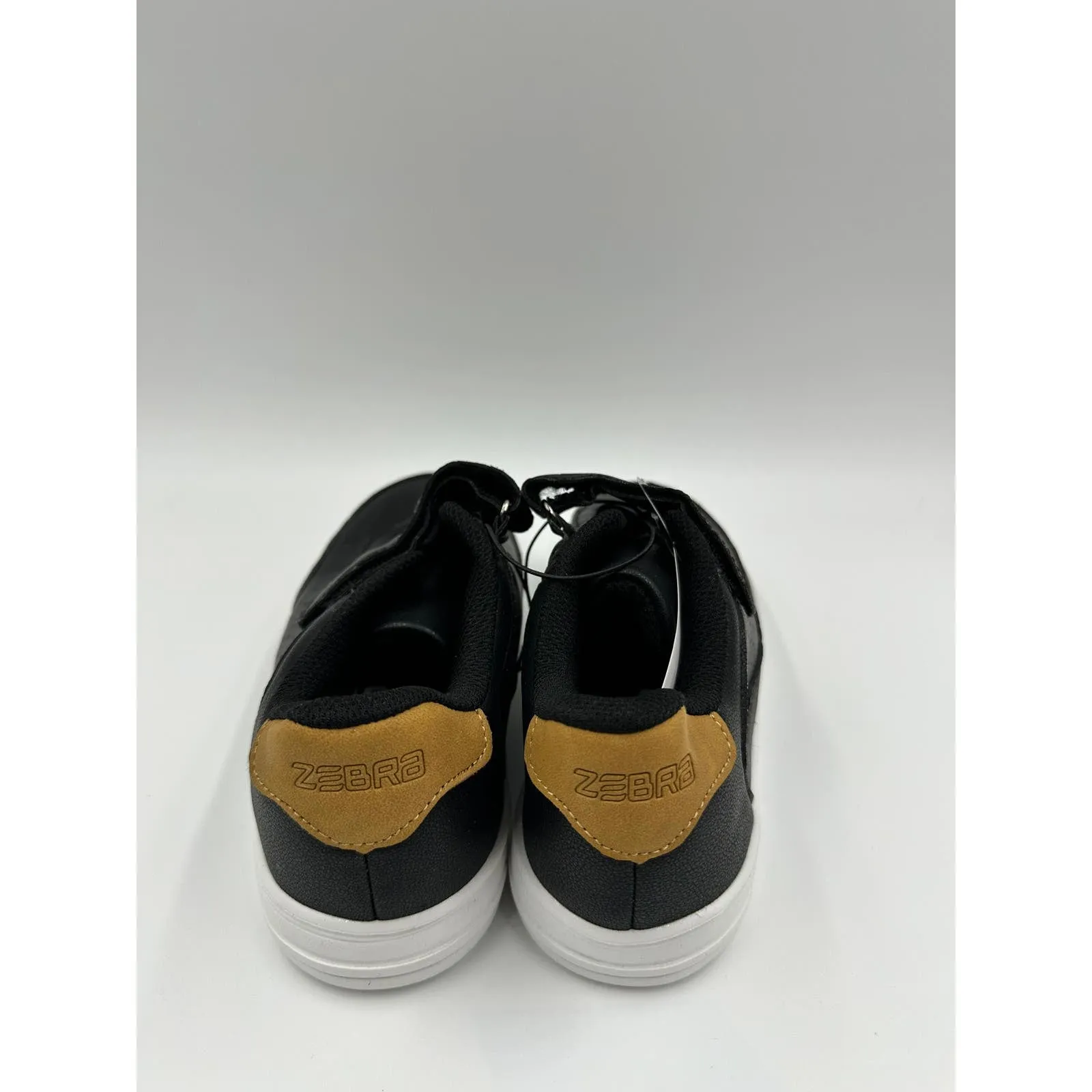 Big Kid Size 2, Black Fashion Sneaker with Strap, Brown Heel Accent & White Sole