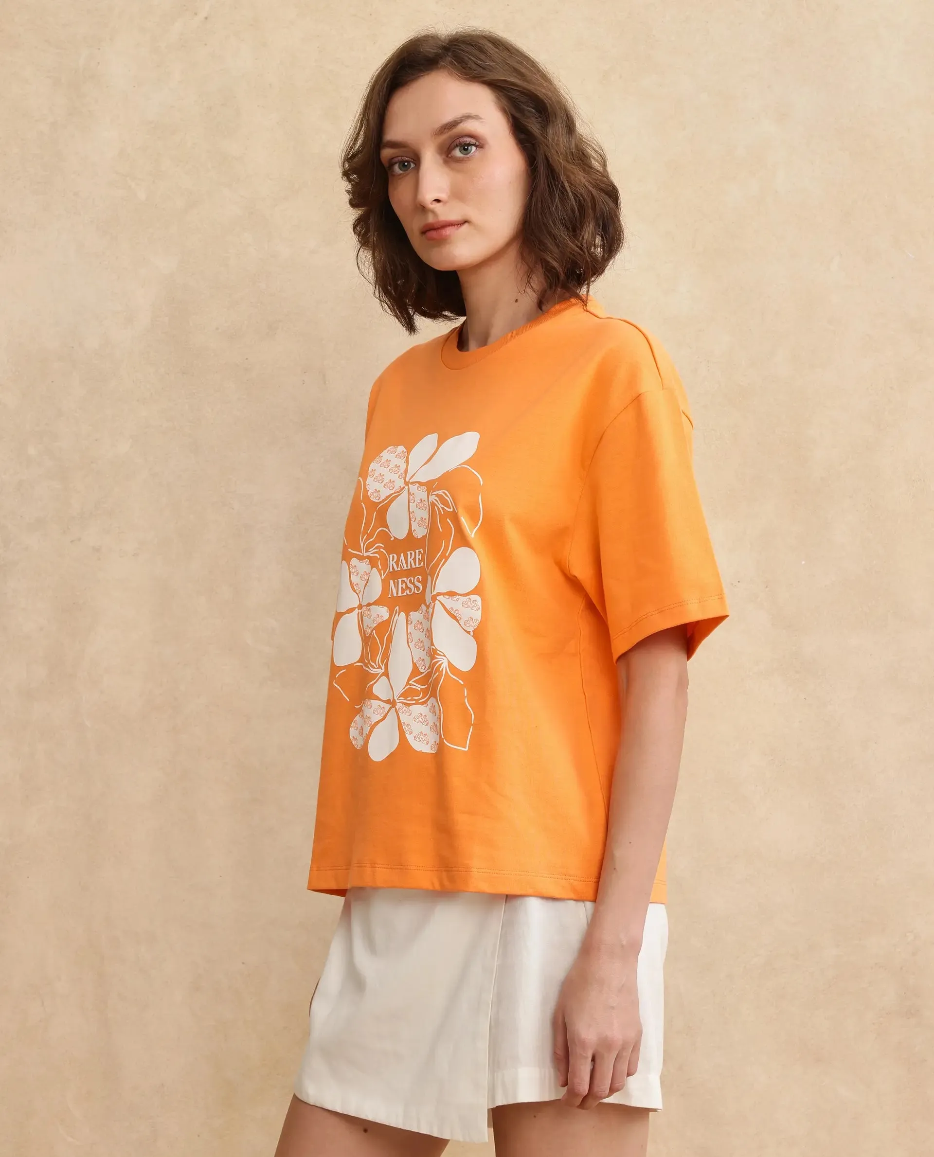 Rareism Women Stunt Orange Cotton Blend Fabric Short Sleeve Crew Neck Oversized Fit Graphic Print T-Shirt